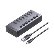 HUB DE 7 PUERTOS USB 3.0 / 4 PUERTOS DE CARGA INTELIGENTE / INTERRUPTOR INDIVIDUAL / INDICADORES LED / USB 3.0 A 5GBPS / 1 USB-C HEMBRA (SOLO DATOS) / INCLUYE ADAPTADOR DE CORRIENTE 12V 2A / 7 EN 1-Accesorios Generales-UGREEN-Bsai Seguridad & Controles