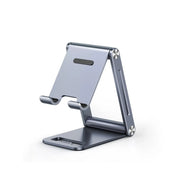 SOPORTE PARA TELÉFONO CELULAR DE ALUMINIO / ANGULO AJUSTABLE / AMPLIA COMPATIBILIDAD CON DISPOSITIVOS DE 4.7'' A 7.9'' / ANTIDESLIZANTE / ANTIARAÑAZOS / PLEGABLE / COLOR GRIS-Accesorios-UGREEN-Bsai Seguridad & Controles
